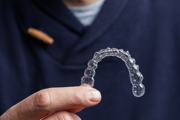 Invisalign® Dentist Or Orthodontist: What’s The Difference And Why It Matters?
